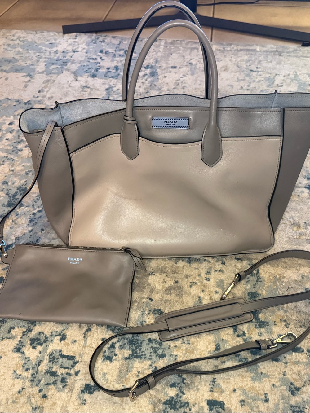 Prada tote with shoulder strap and zipper wallet